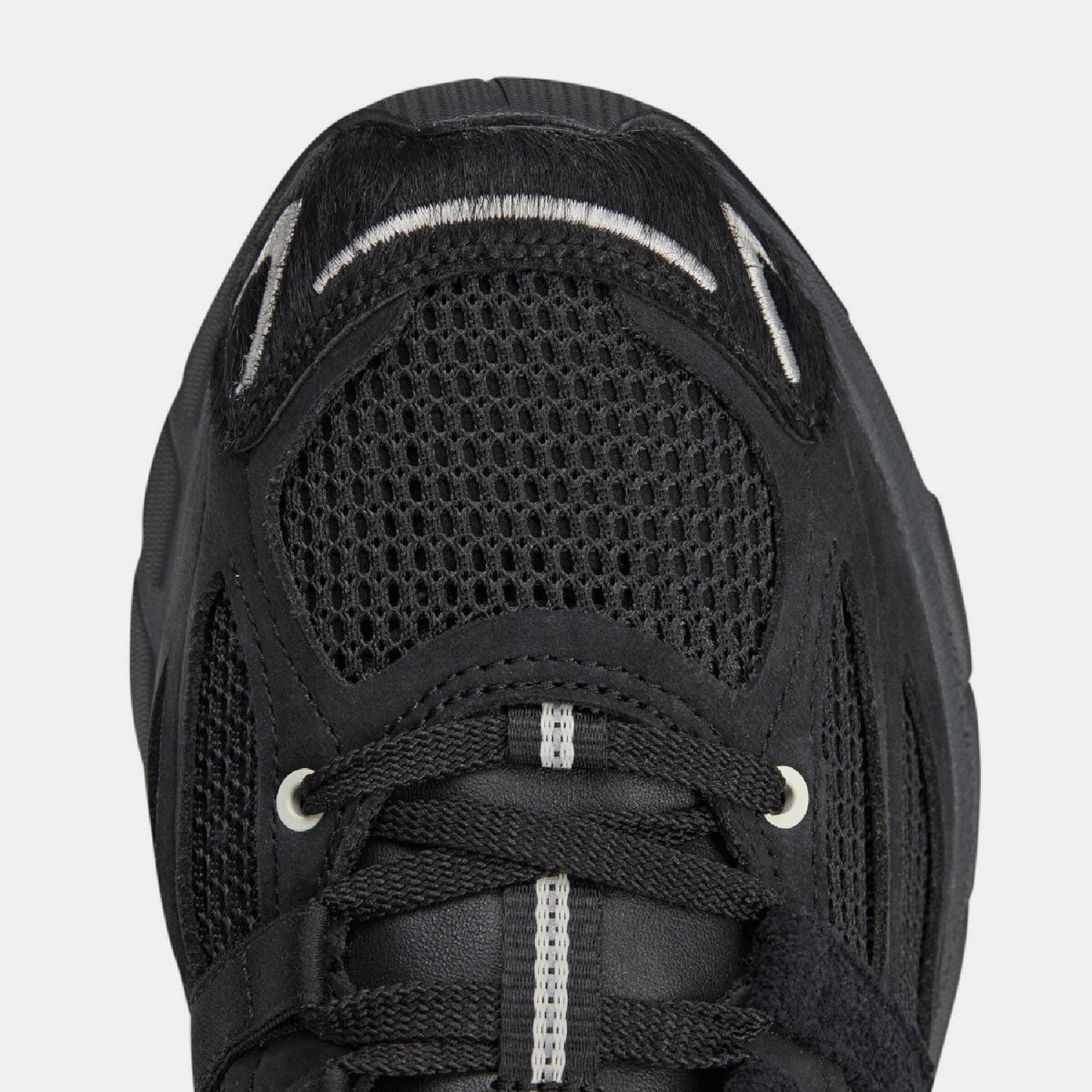 adidas Originals Adistar Cushion STFM trainers in black with white accents, lightweight athletic footwear for comfortable running and training
