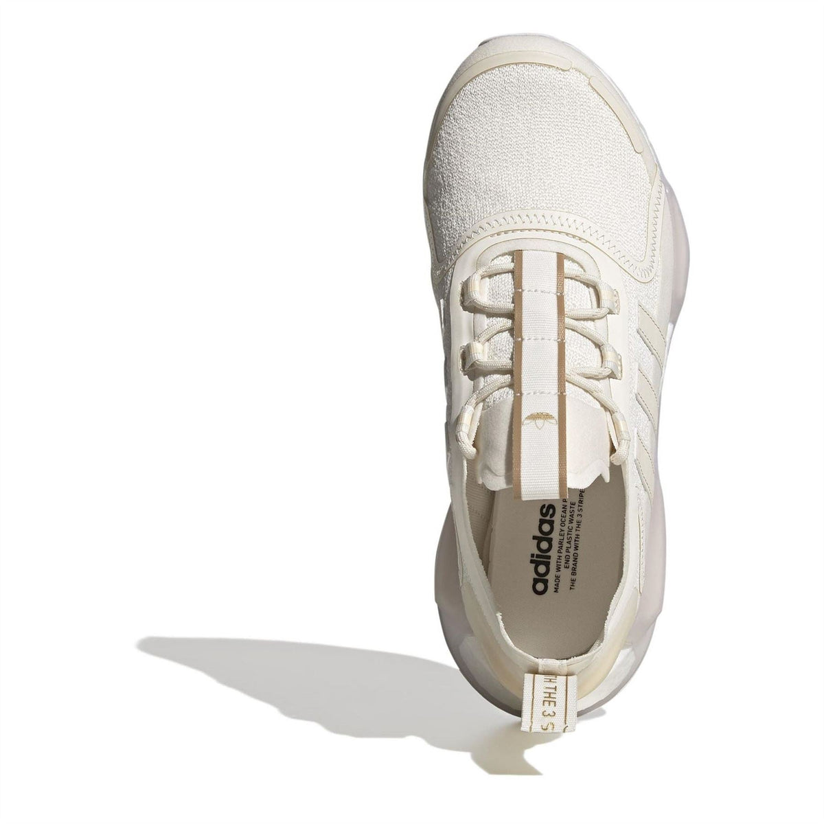 adidas Originals low-top trainers, light white upper with laces and adidas logo on the insole