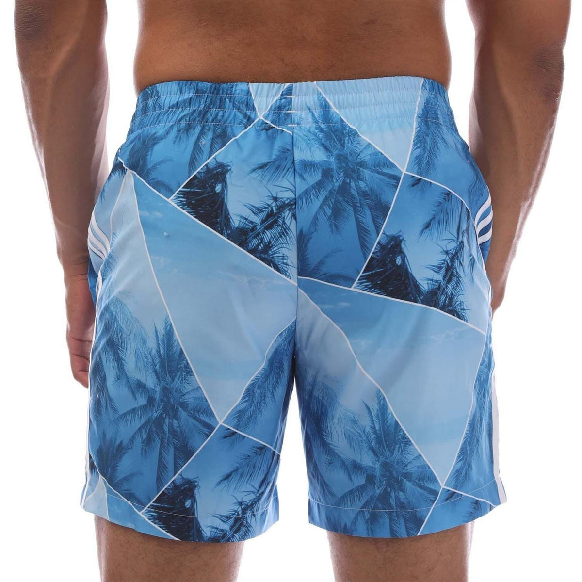 adidas Originals swim shorts featuring a vibrant print, elastic waistband, and lightweight fabric for comfortable beachwear.