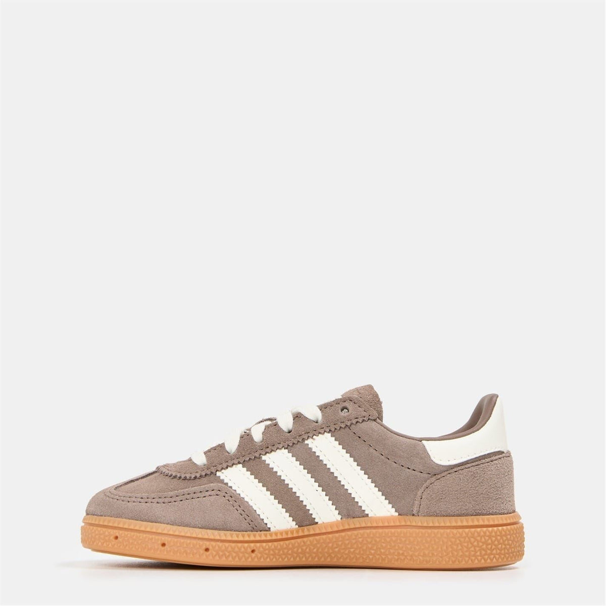 Brown low-top sneakers with white triple stripes, lace-up front, gum sole