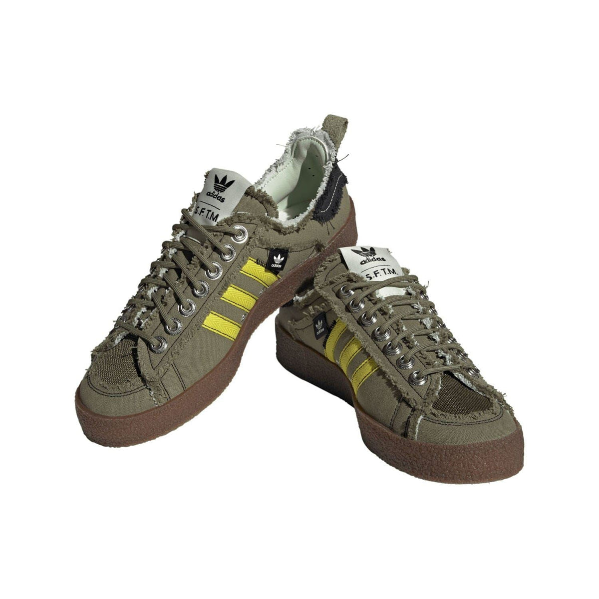 adidas Originals Campus 80s trainers pair with olive uppers, striped panels and fur trim