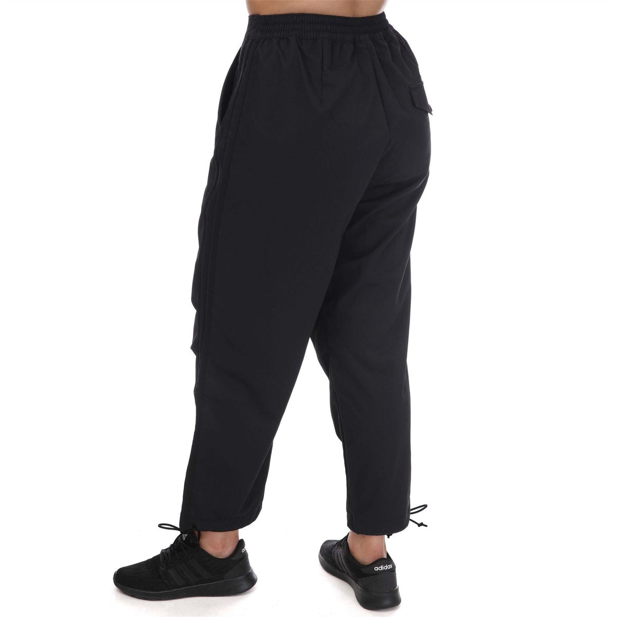 Black adidas Originals woven pants with elastic waist and ankle cuff tie detail