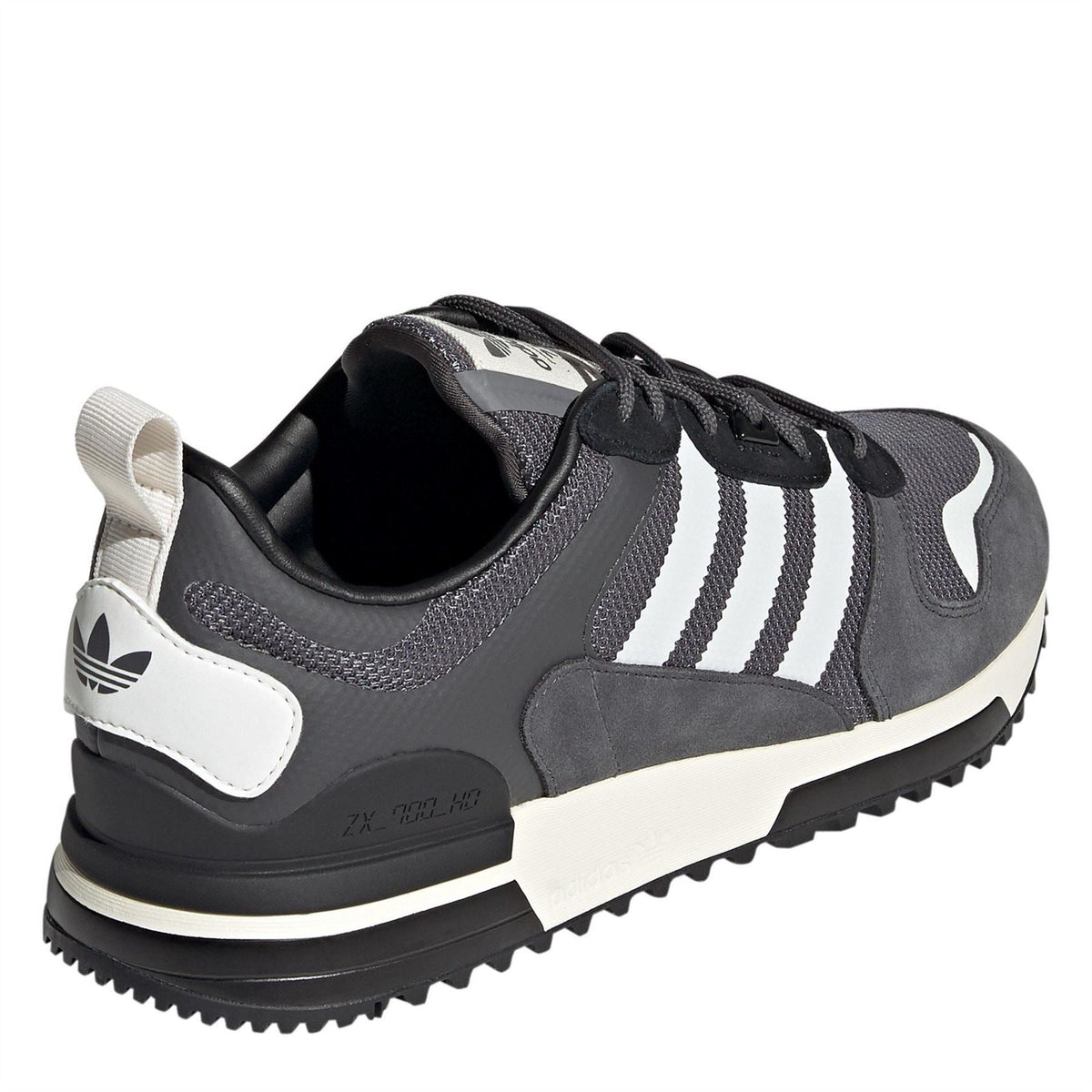 adidas Originals ZX 700 HD low-top trainers in black and white, showcasing the classic sporty footwear design.