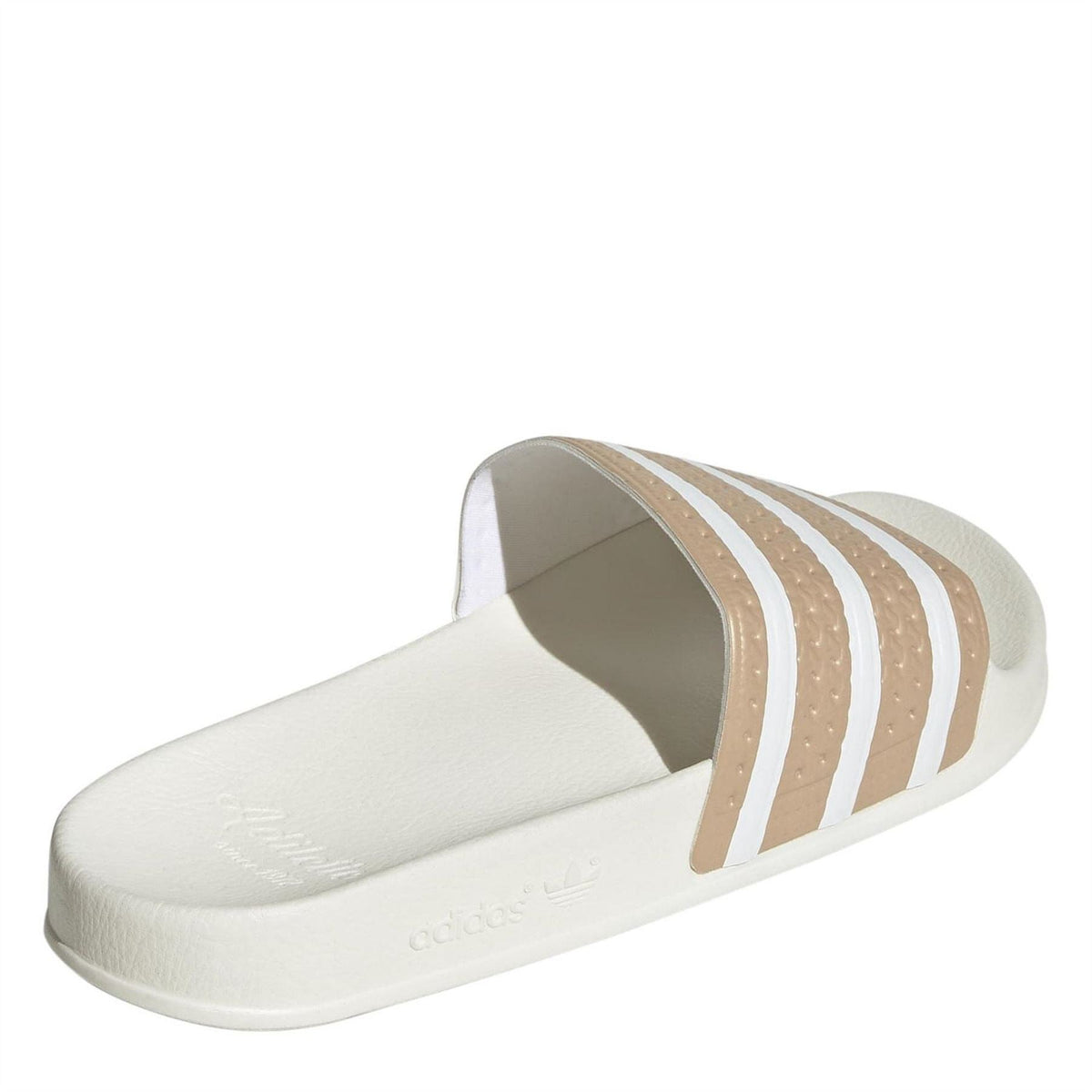 adidas Originals junior slide sandals, open front view with beige-and-white stripes