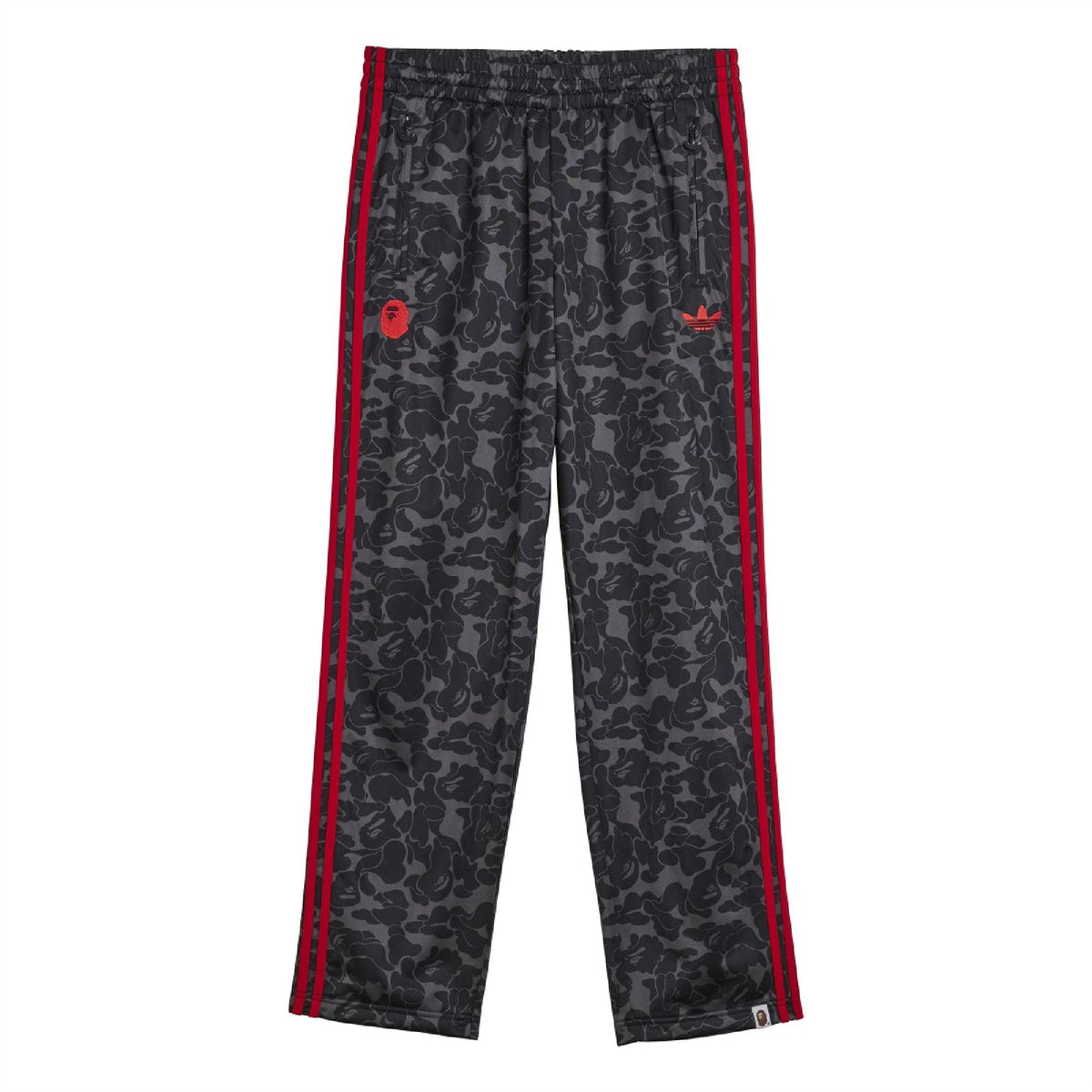 Black camo trackpants with red side stripes, elastic waistband, tapered leg.