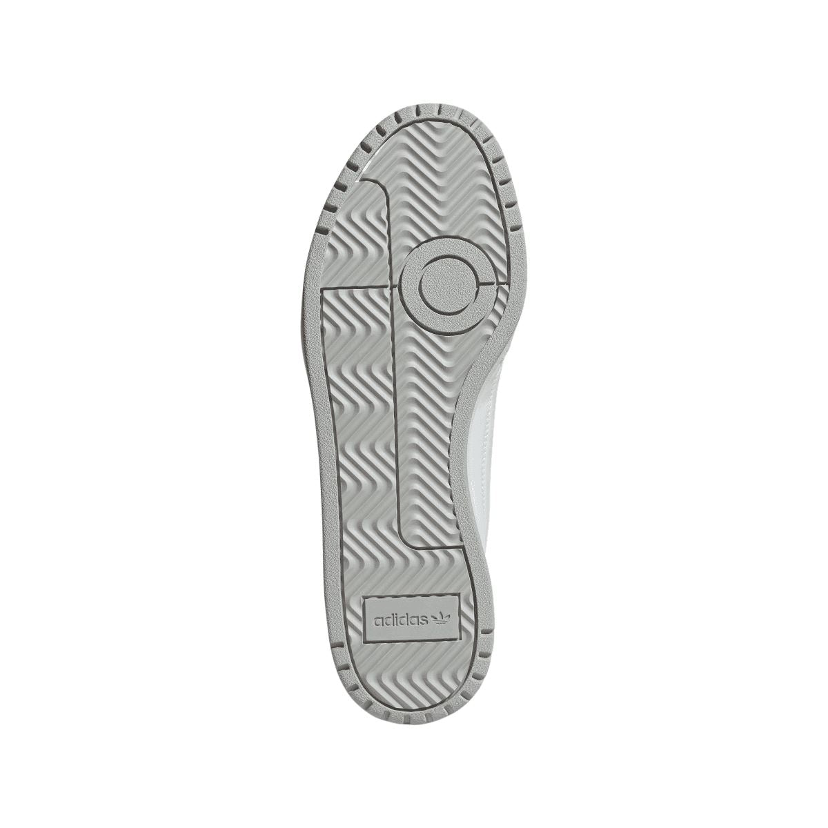White adidas NY 90 trainers outsole view with textured tread and heel logo