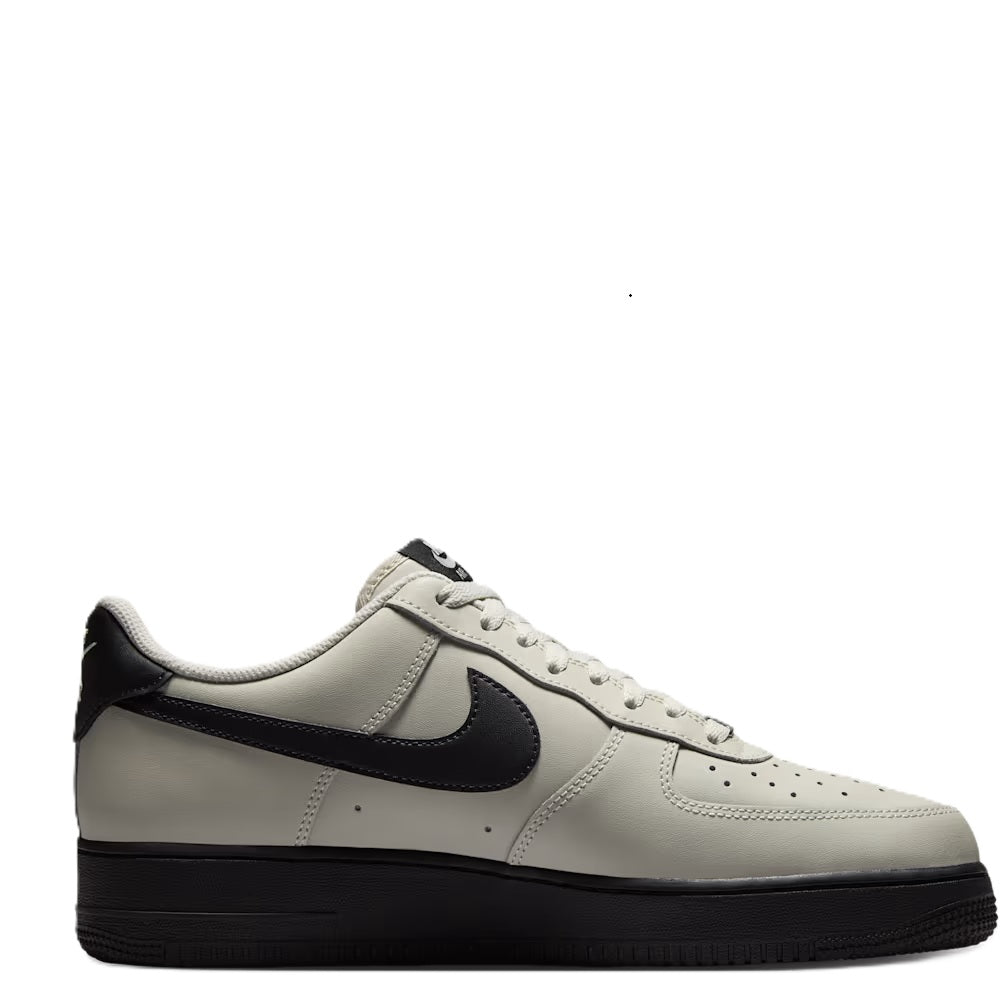 Nike Air Force 1 '07 low-top sneakers in light bone with black Swoosh and black sole