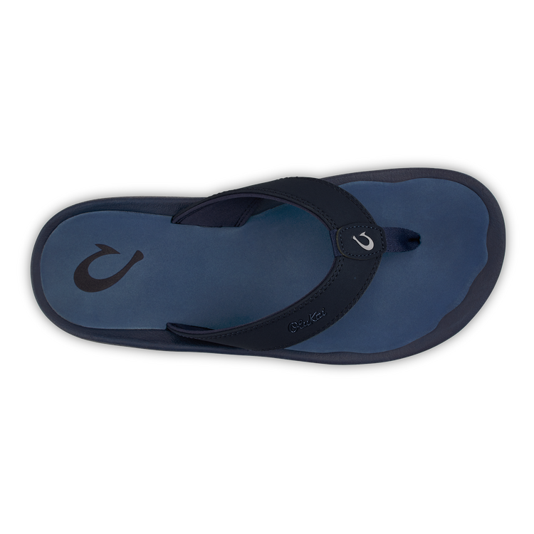 Blue thong sandals with navy straps, textured sole, and OluKai logo