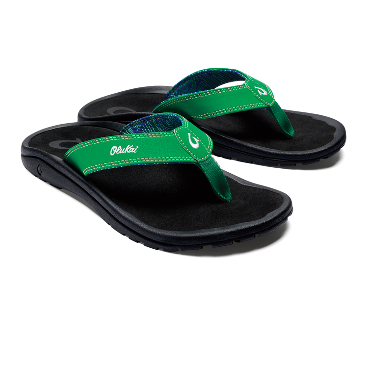 Flip-flop sandals with bright green straps and multicolor patterned toe thong