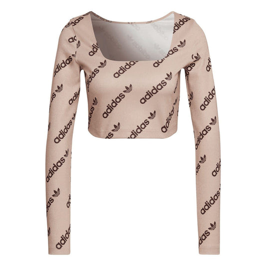 adidas Originals long-sleeve crop top in blush pink with allover adidas logo print