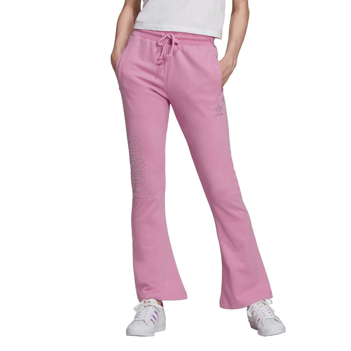adidas Originals pink flared jogger pants with drawstring waist and side logo detail