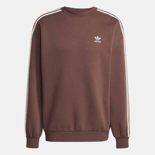 Brown oversized crewneck sweatshirt with Adidas trefoil logo and ribbed cuffs