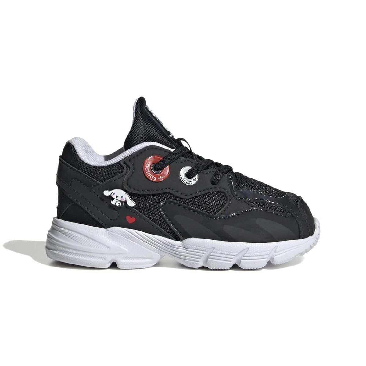 Black low-top trainers with chunky white sole, lace-up front, side logo detail