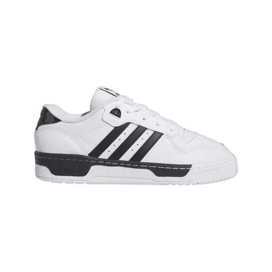 White low-top trainers with three black stripes and black heel panel