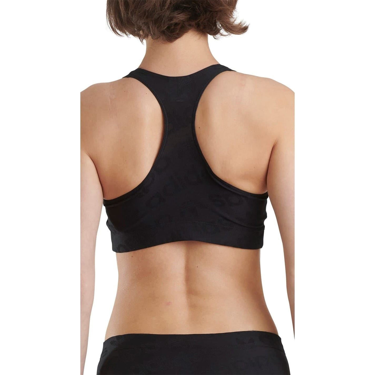 Women's black racer back crop top, open back racerback straps and center neck seam.