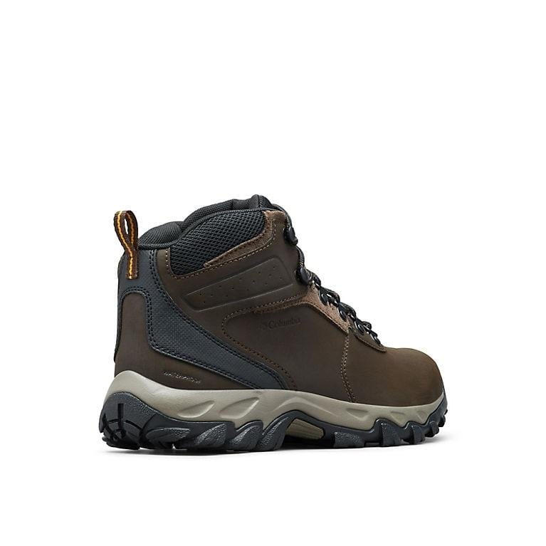 Brown ankle hiking boots with dark blue panels and textured toe bumper