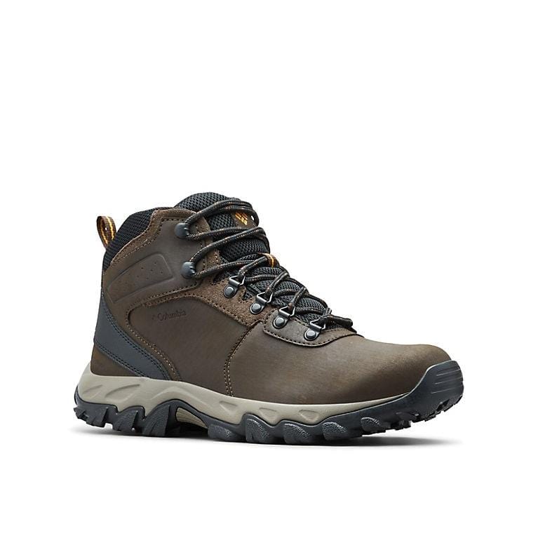 Brown ankle hiking boots with black laces, padded tongue, and chunky sole