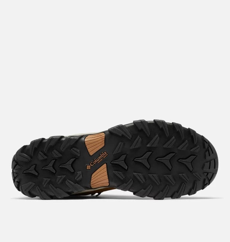 Hiking boot outsole with deep black tread and tan logo patch