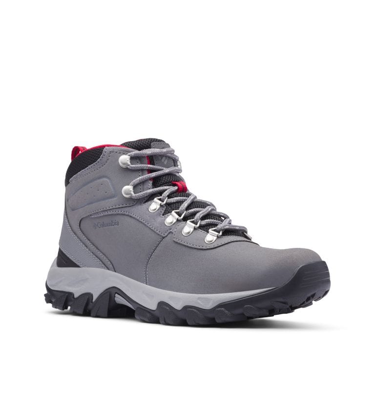 Gray waterproof hiking boot with black collar, red accents, and grippy black outsole.