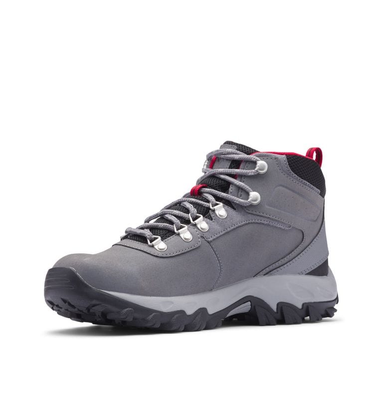 Gray mid-cut waterproof hiking boot with red lining, lace-up closure, and treaded sole.