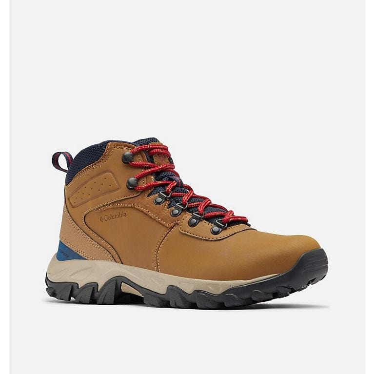 Tan waterproof hiking boots with red laces and blue ankle panel, gray tread sole