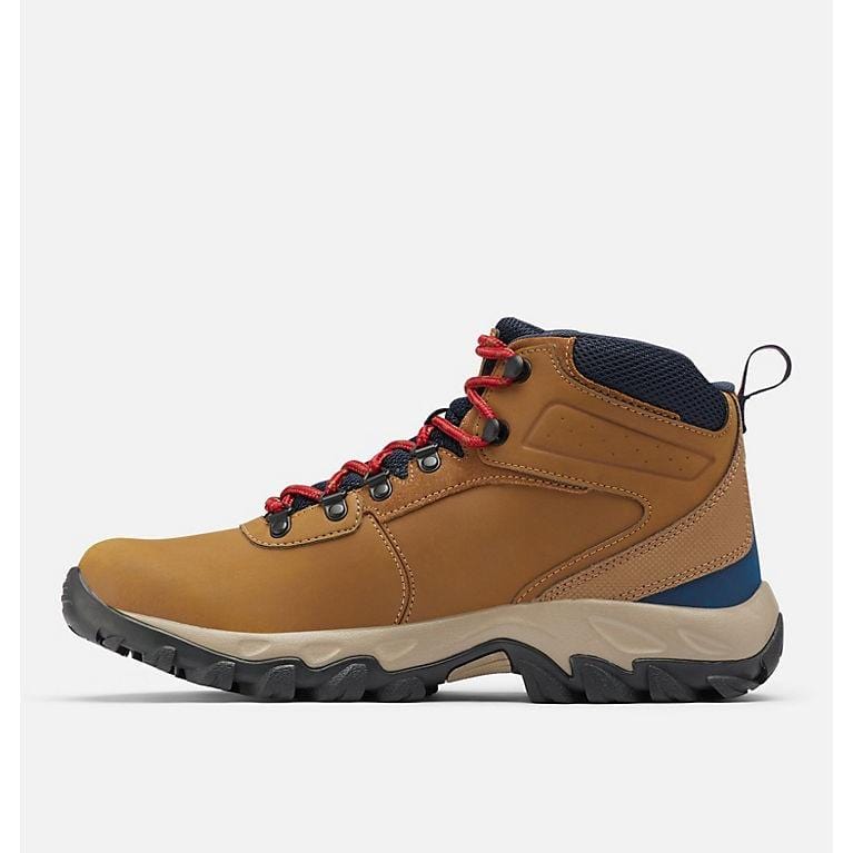 Tan waterproof hiking boots with red laces, navy collar, and blue midsole accents
