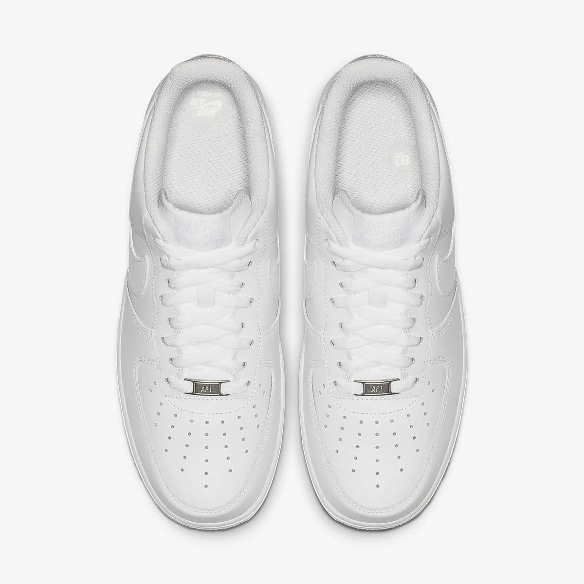 White Air Force 1-style sneakers viewed from the top, with lace-up detail