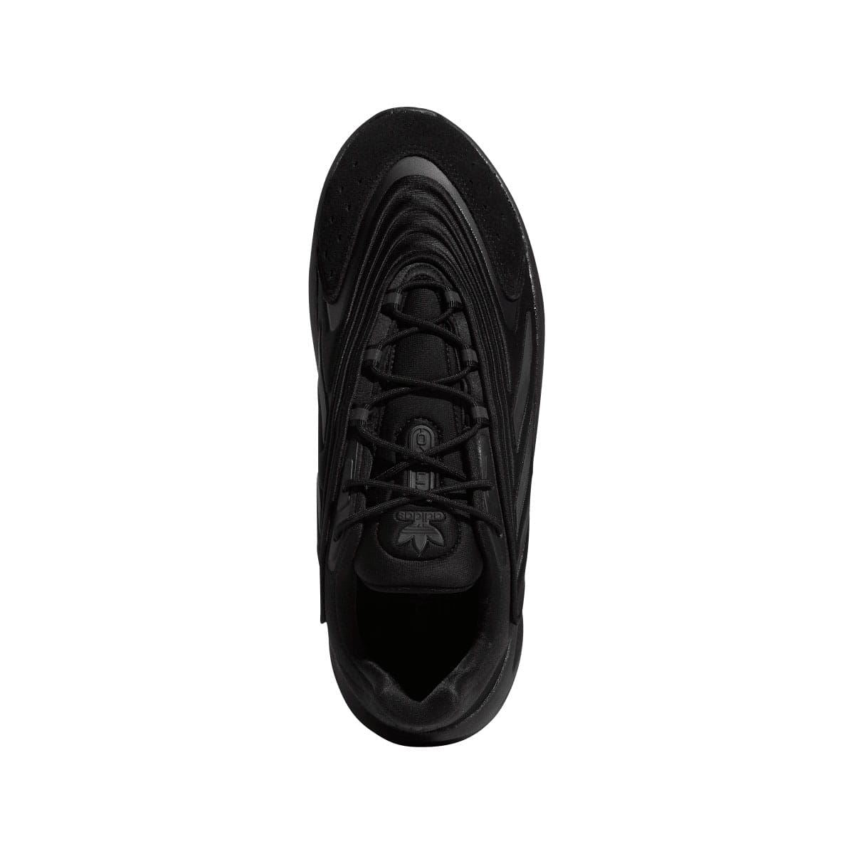 Black lace-up sneaker top view with padded collar and logo at tongue