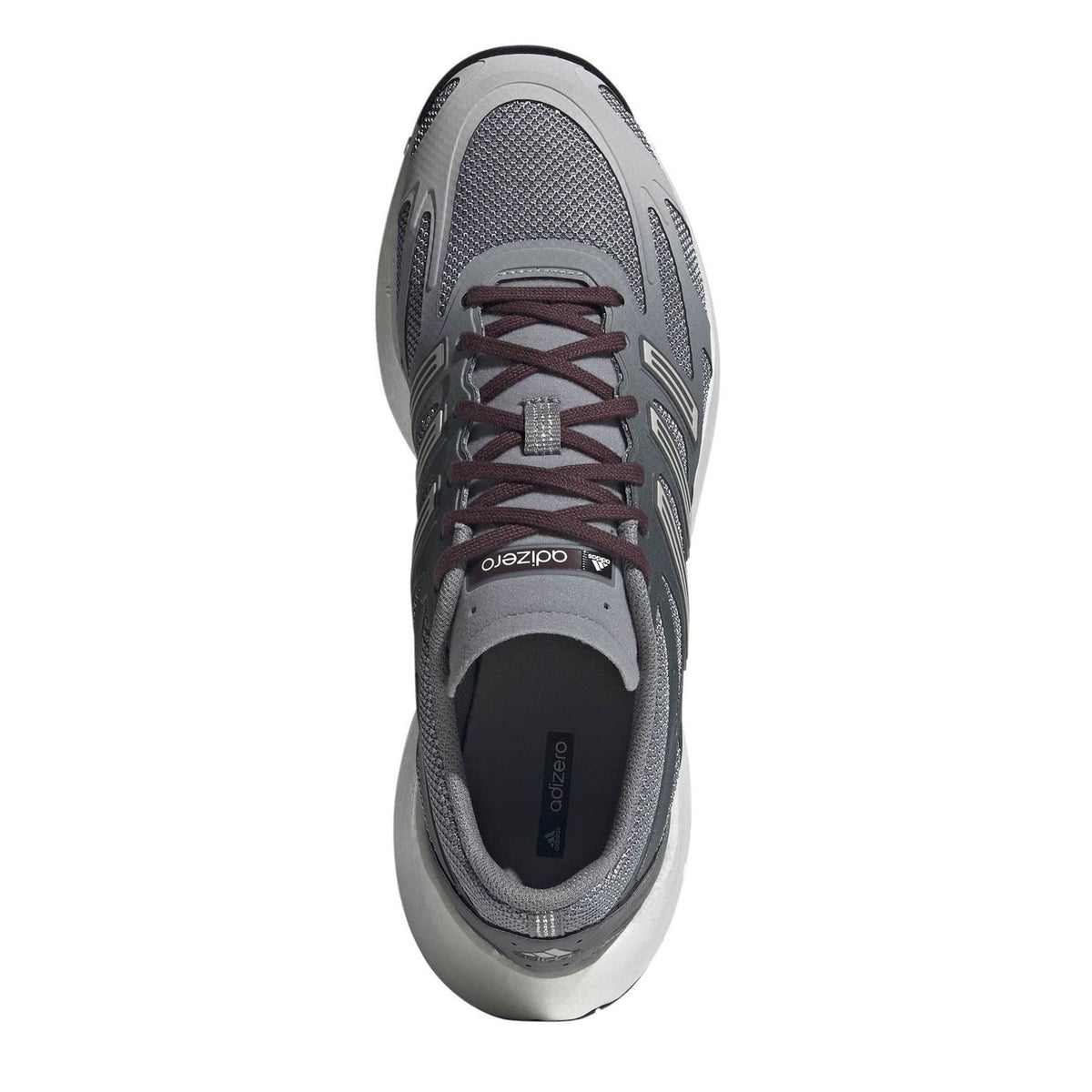 Grey lace-up shoes with maroon laces, black tongue lining, and white sole