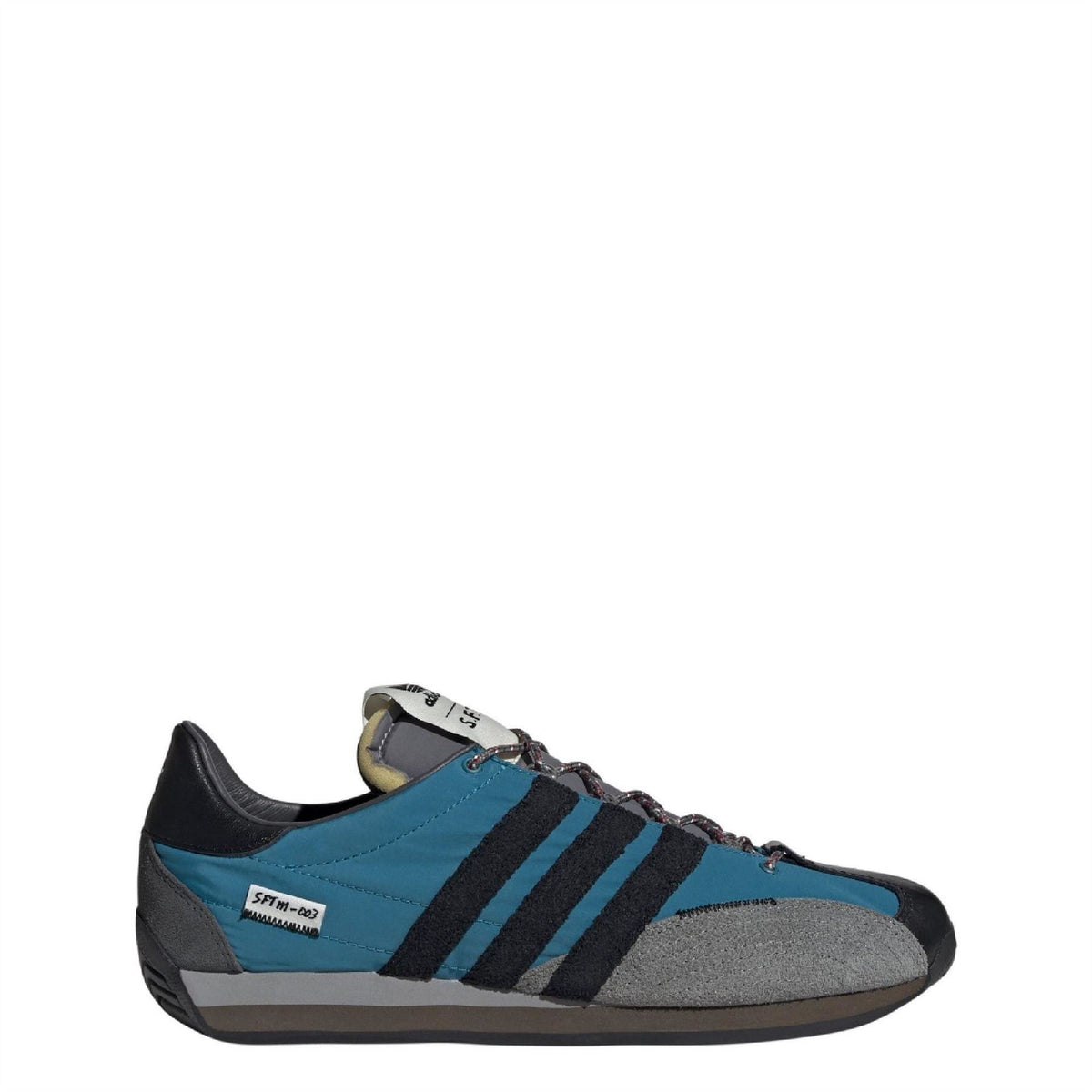 Teal and dark sneakers with three stripes, lace-up front, suede-style panels