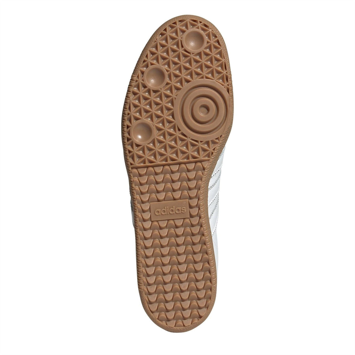Brown gum rubber outsole with tread pattern for low-top adidas sneakers