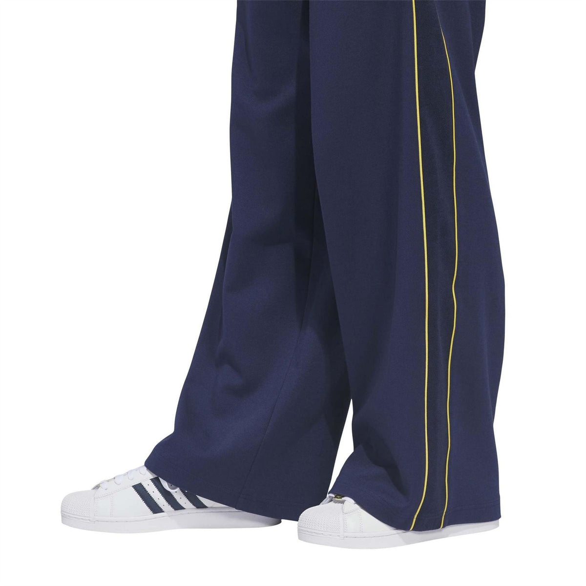 adidas Originals men’s woven joggers, dark blue with two yellow side piping lines