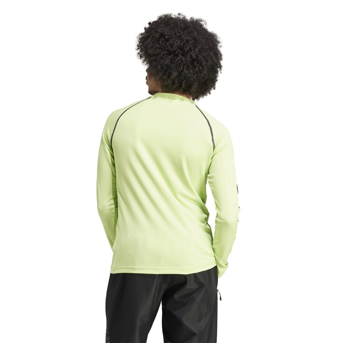 Back view of lime green compression-fit raglan sleeve t-shirt with black shoulder stripe