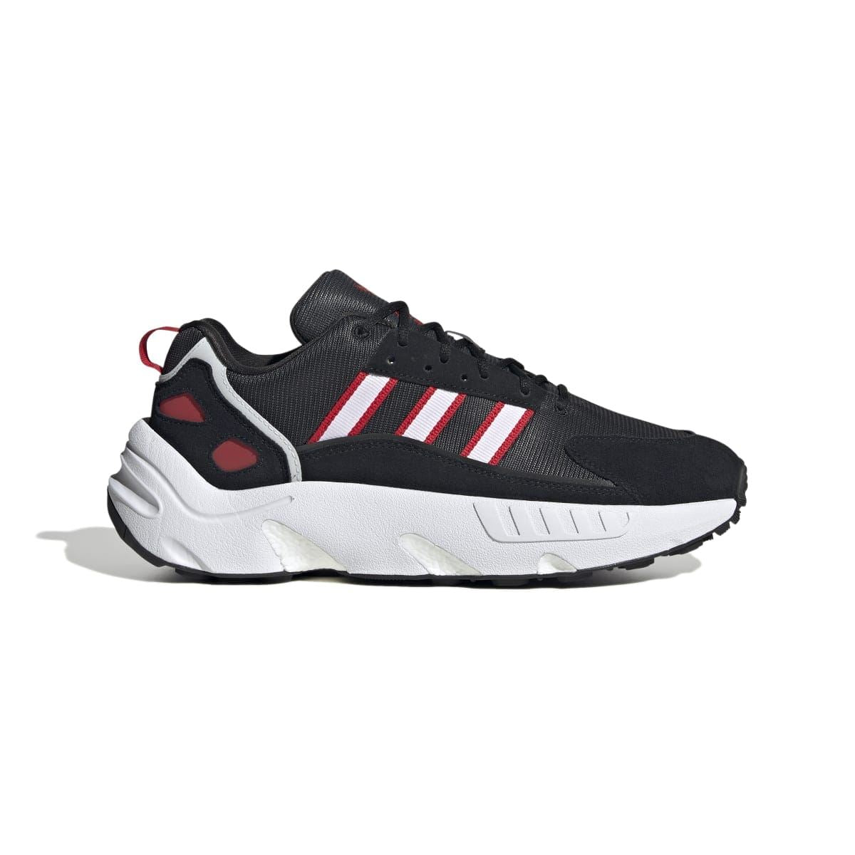Black, white, and red adidas Originals ZX 22 Boost trainers with striped upper and chunky sole