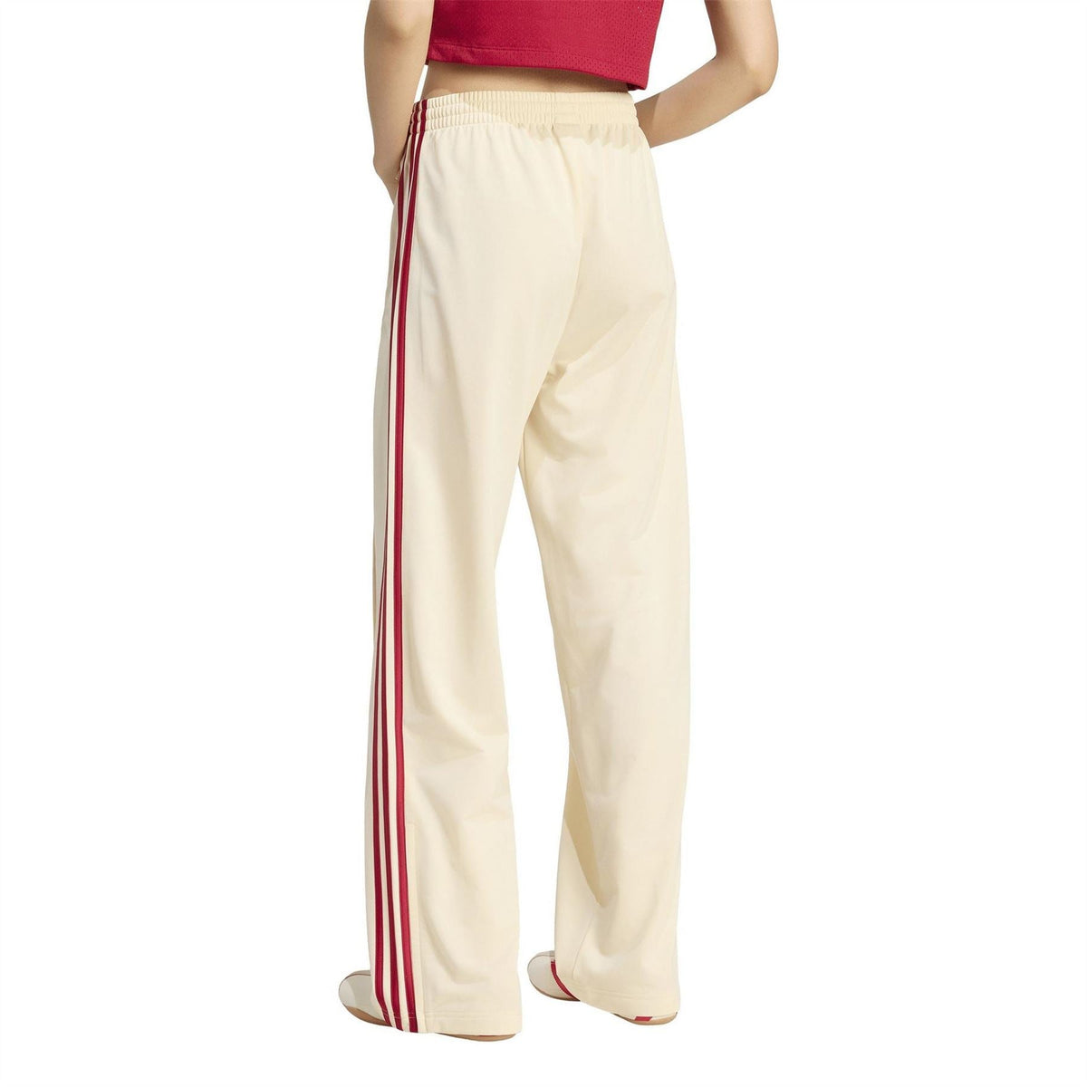 Cream womens jogger pants with vertical red stripes and relaxed wide leg