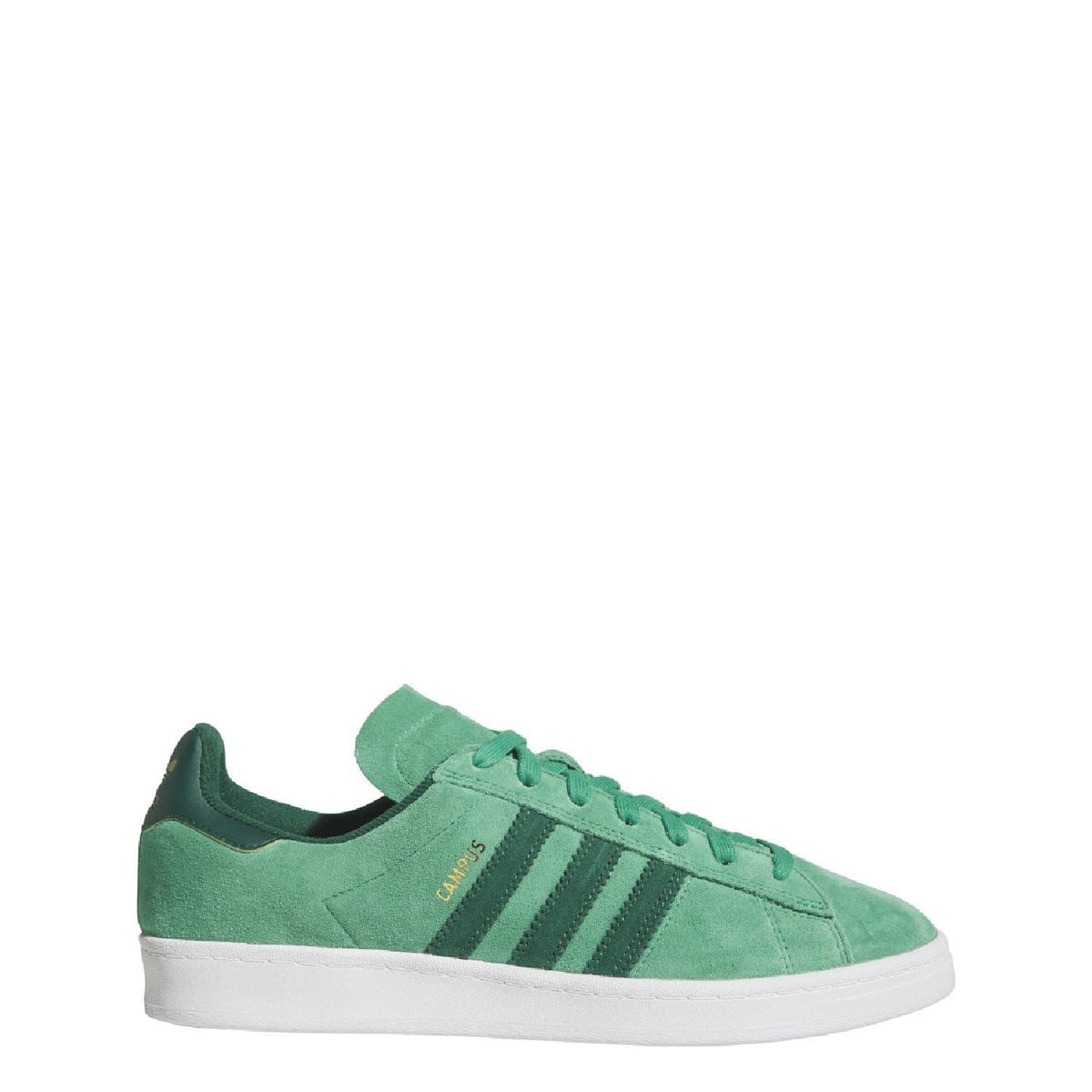 Green low-top suede trainers with lace-up closure and branded tongue label