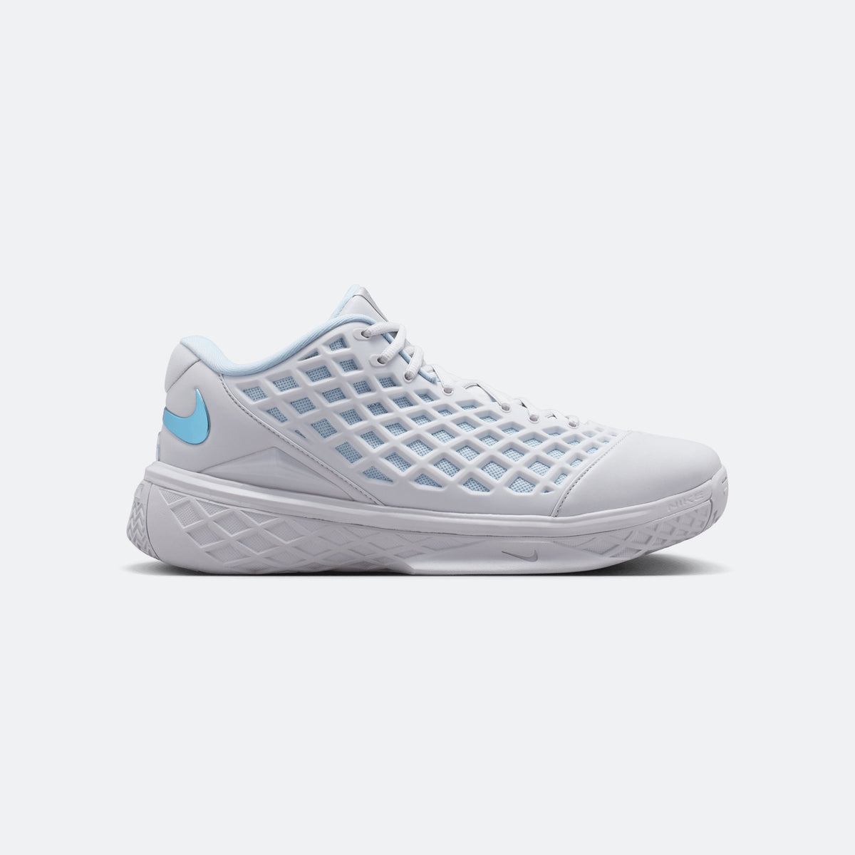 Light blue and white basketball shoe with mesh upper, lace-up closure, and molded sole