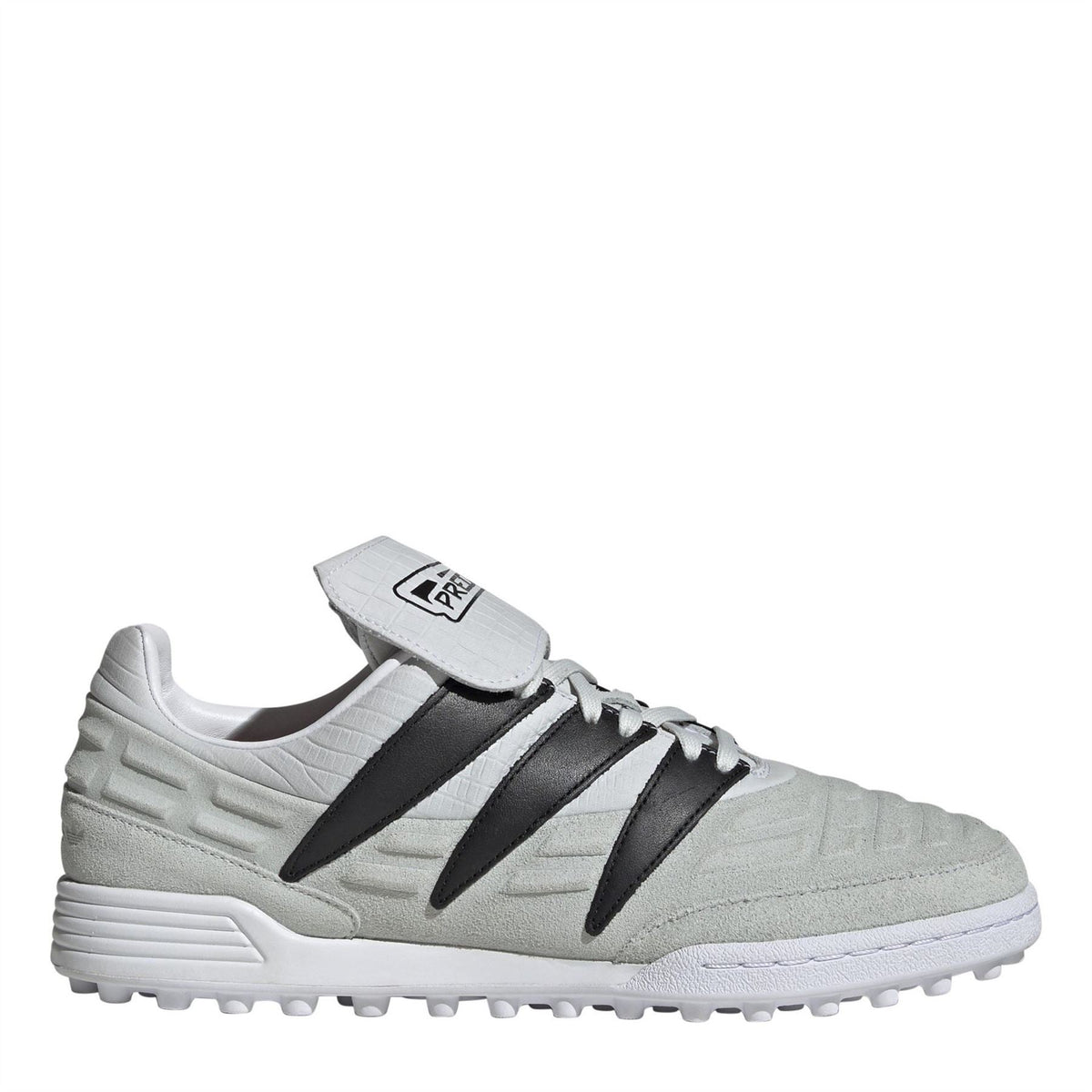 Low-top soccer cleat in light gray with black stripes and Velcro strap