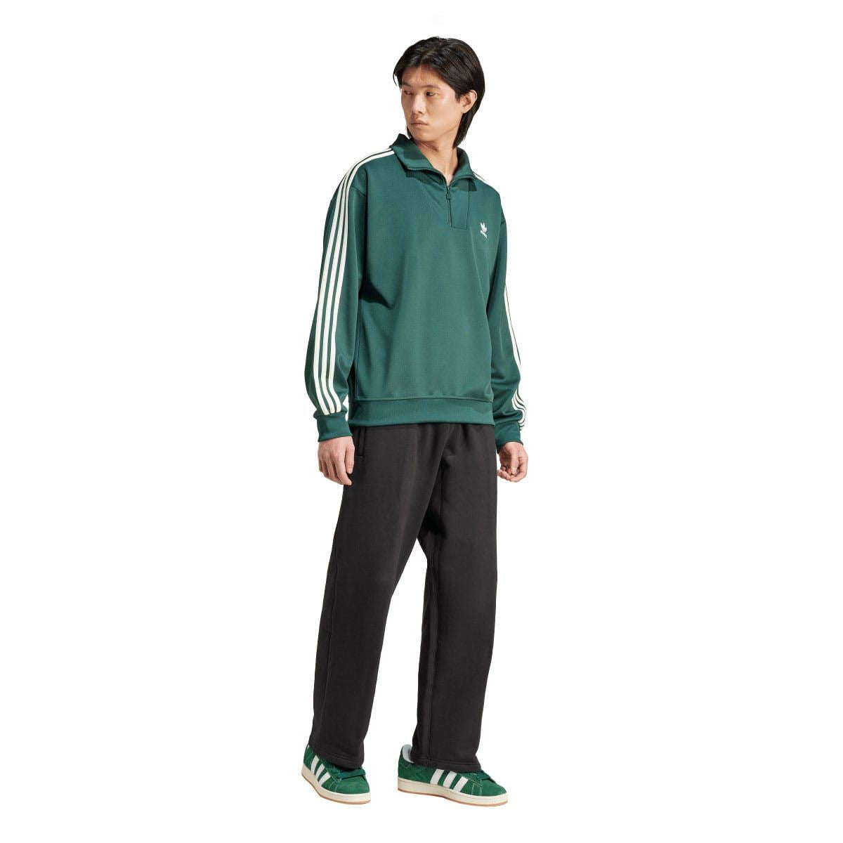 Green adidas Originals track top with funnel neck, quarter-zip, and white 3-stripe sleeves