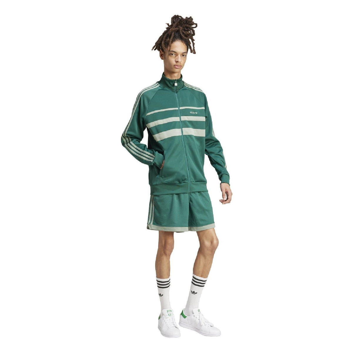adidas Originals First Track Top in black and white, classic athletic tracksuit jacket with logo, casual sportswear or streetwear style