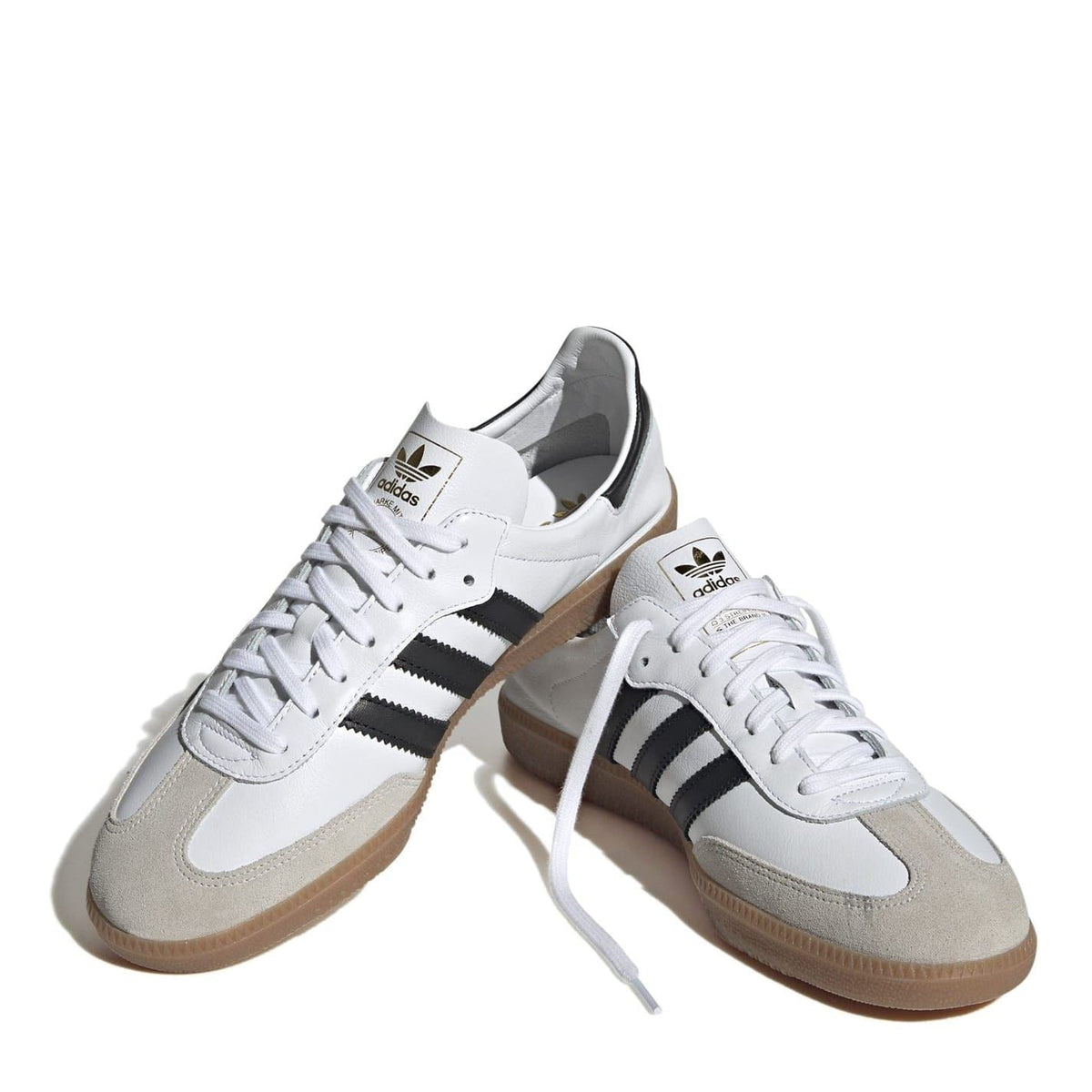 adidas Originals Samba Decon low-top sneakers pair, white uppers with black triple stripes