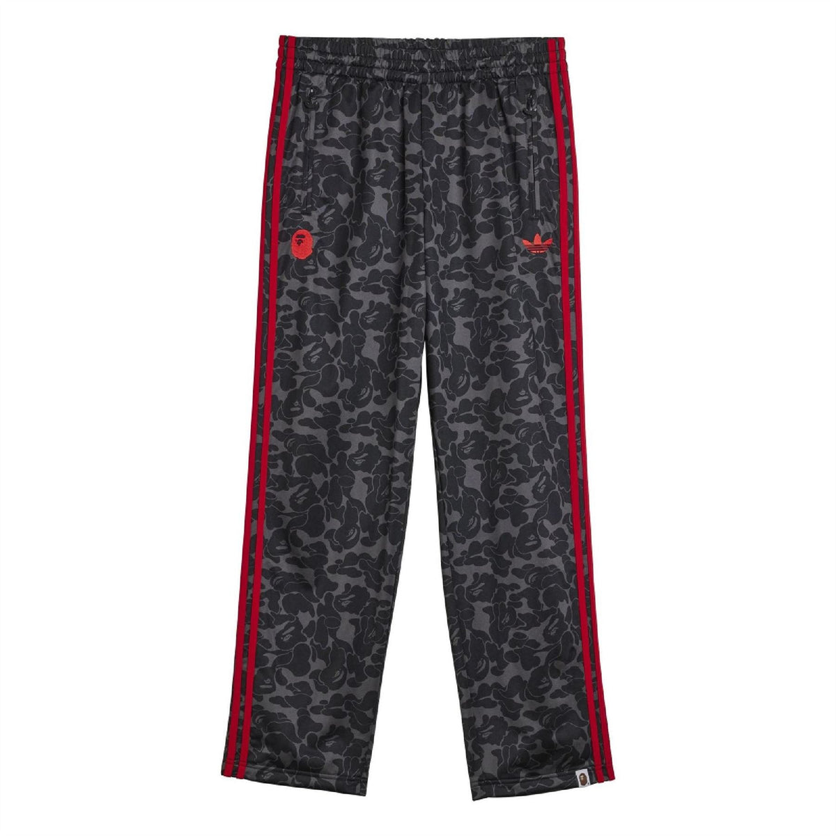 Black camo track pants with red side stripes and trefoil logo on thigh