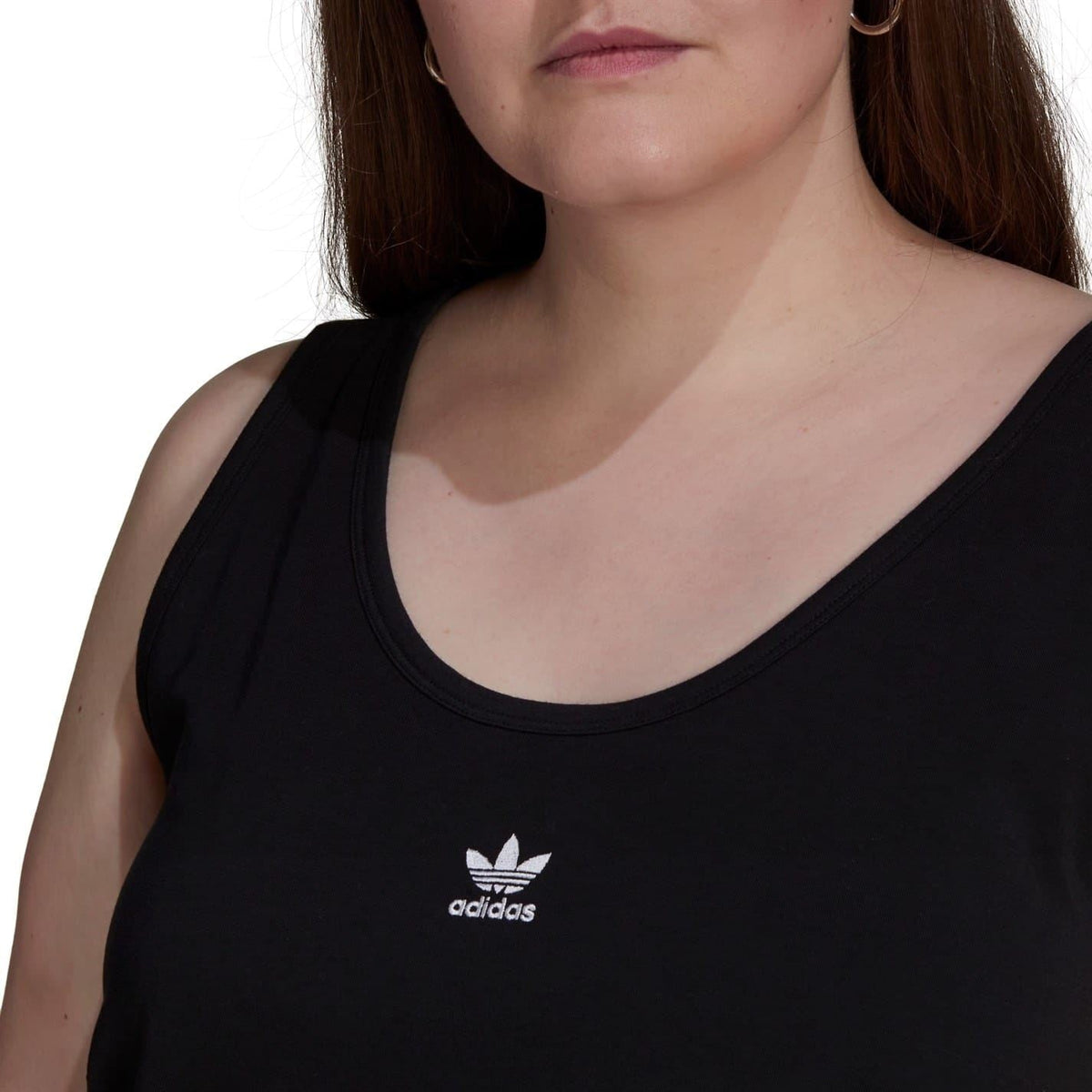 Black adidas Originals tank top close-up with scoop neckline and chest logo