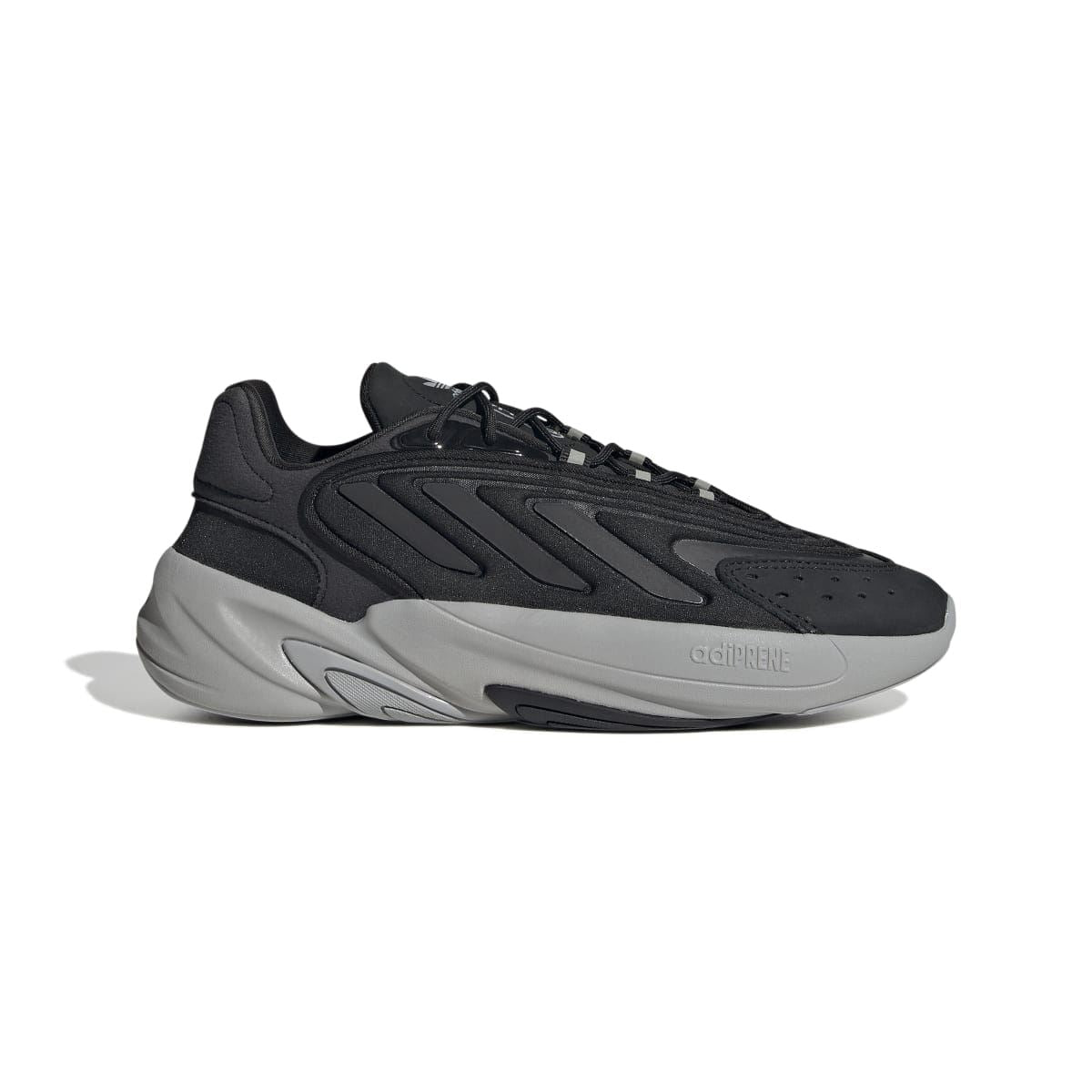 Black adidas Originals Ozelia trainers with lace-up upper and chunky light-gray sole