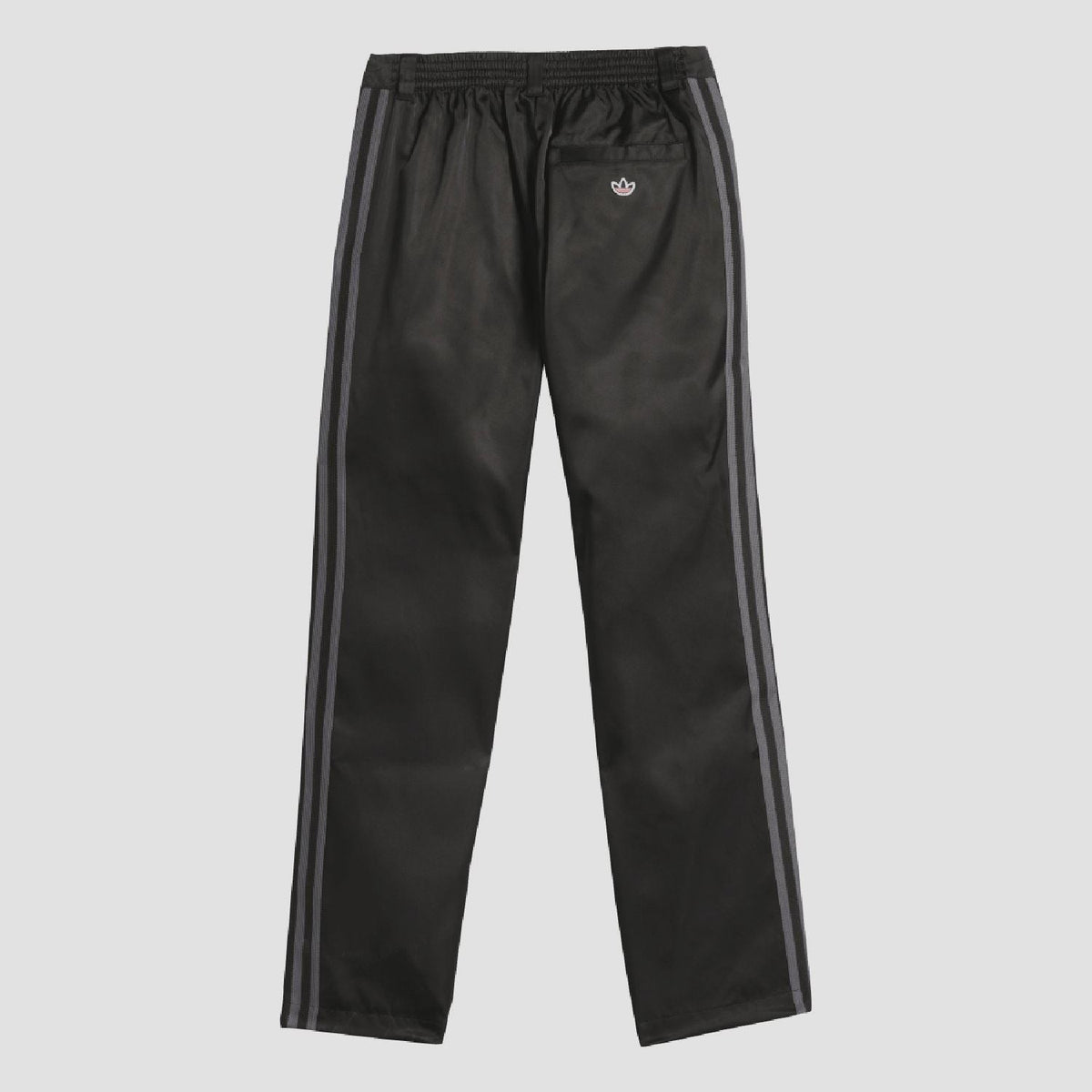 adidas Originals black tracksuit bottoms with elastic waist and side stripe taping