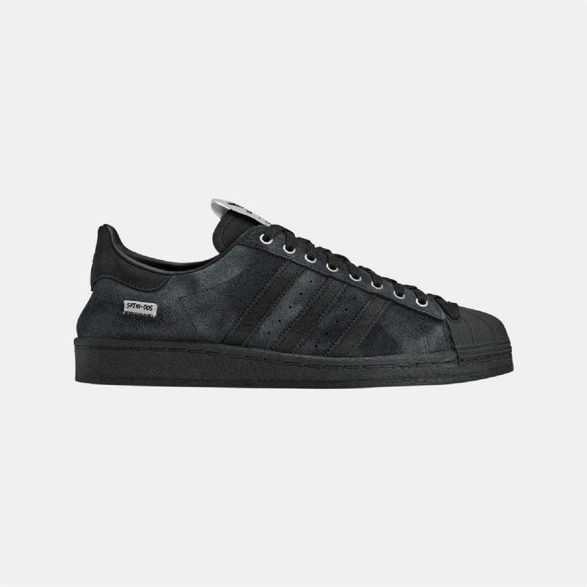 adidas Originals Superstar 82 trainers in white leather with shell toe and rubber sole, showcasing classic athletic footwear design