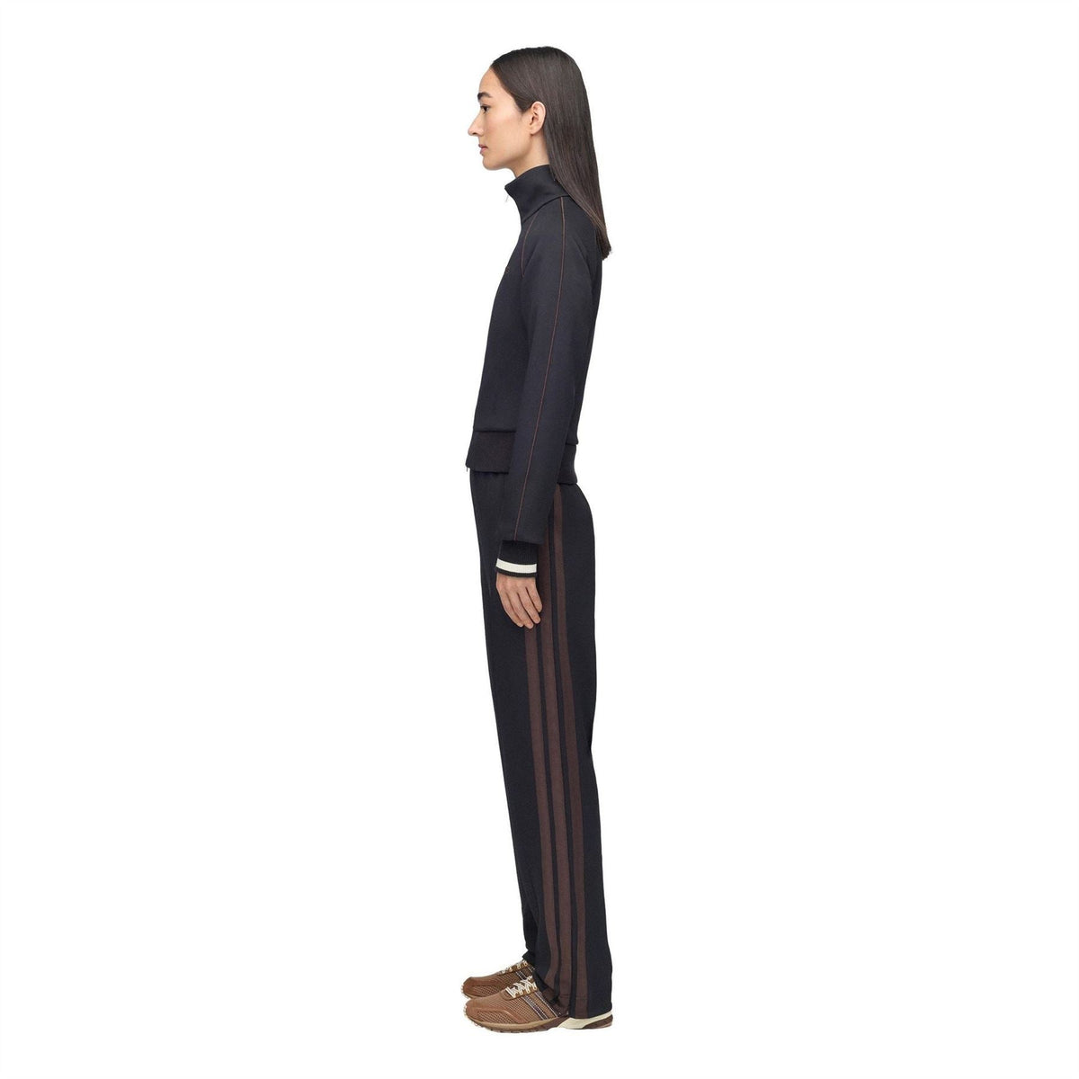 Black track jacket side view with side pocket, ribbed cuffs and hem