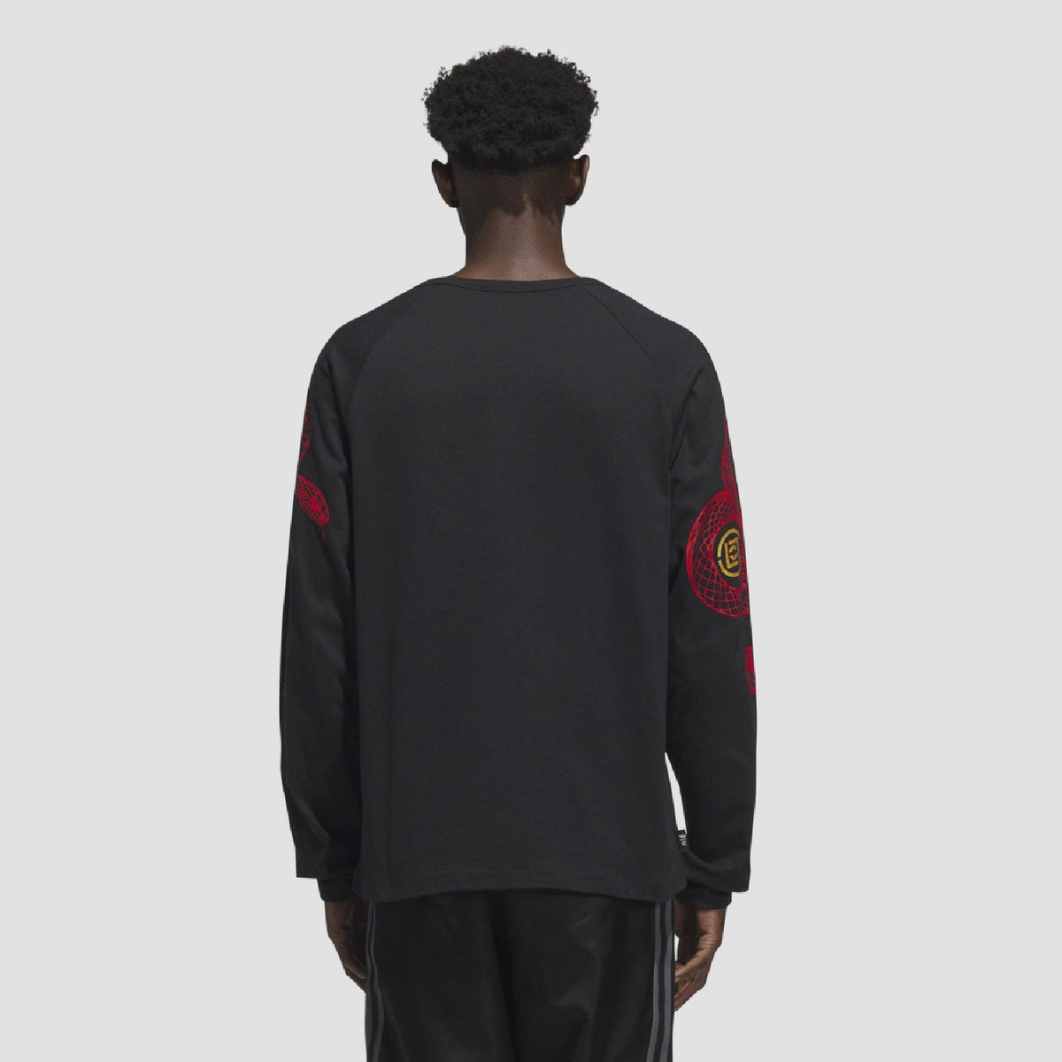 adidas Originals CLOT LNY long sleeve T-shirt featuring vibrant design and branding on black fabric, casual style for everyday wear