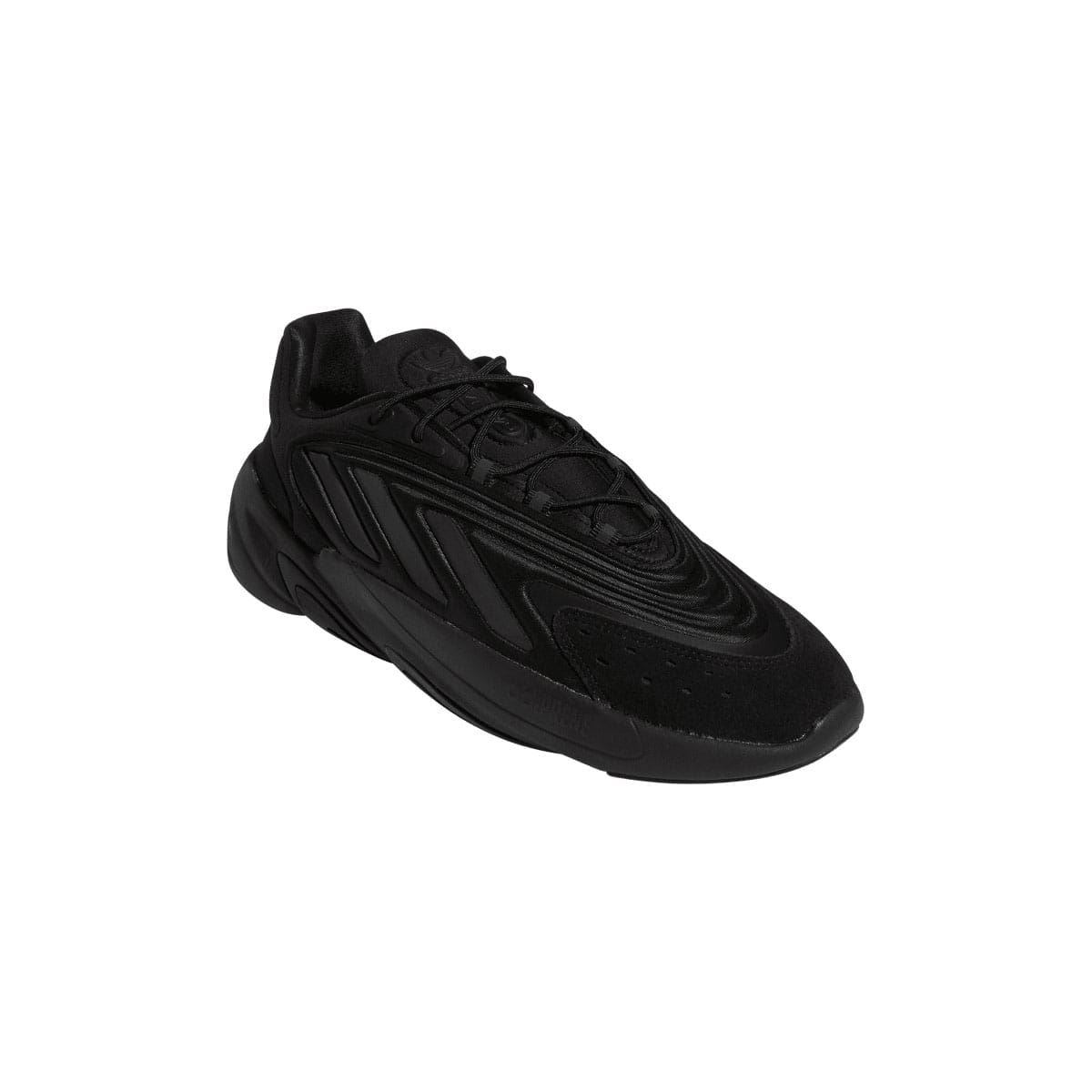 Black low-top trainers, front 3/4 view with lace-up and geometric stripes