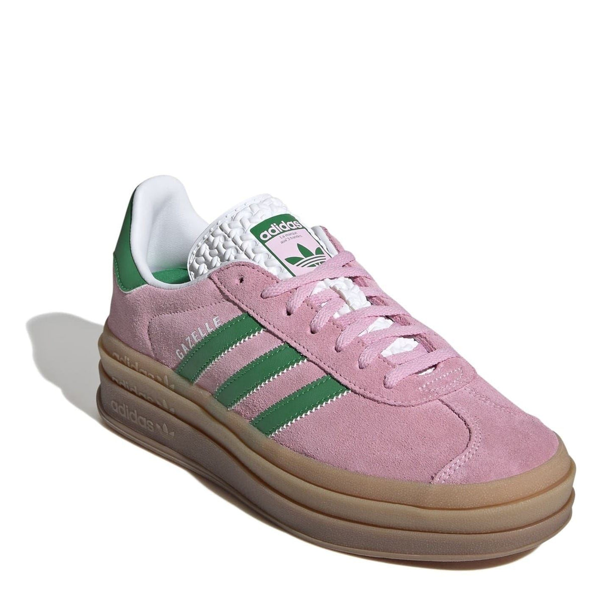 Pink suede Gazelle low-top sneakers with green stripes and lace-up design